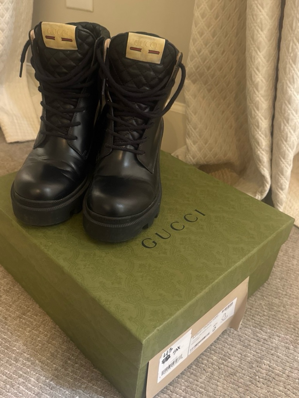 Gucci Black Quilted Lace-Up Leather Combat Boots with Gold Plaque
